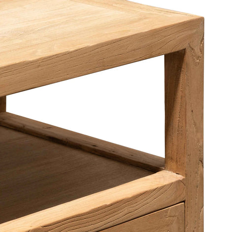 Close-up of a wooden side table with a white background