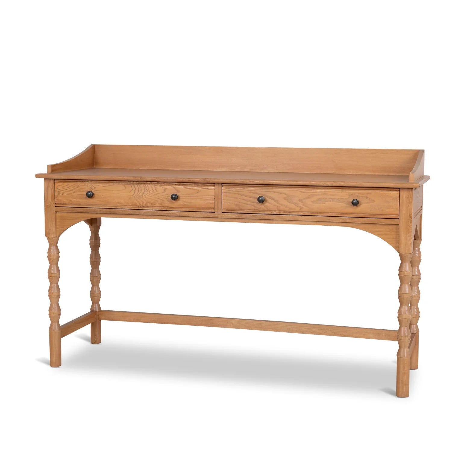 Wooden desk with three drawers on a white background