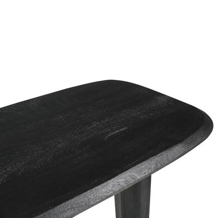 Black wooden table with a white background