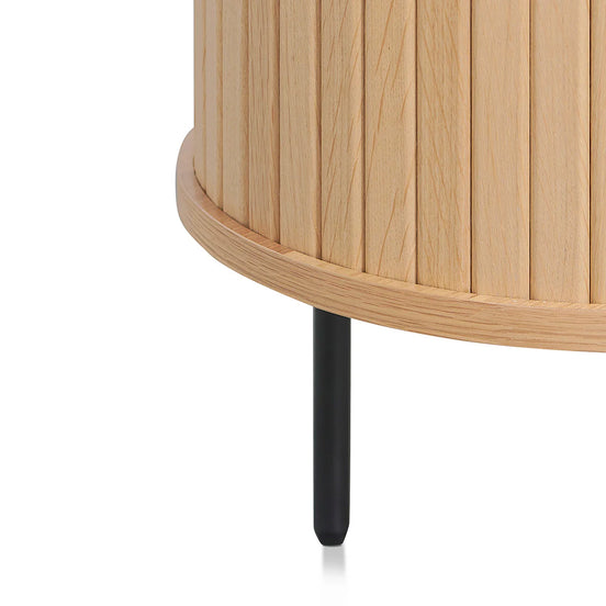 Wooden side table with a black leg on a white background