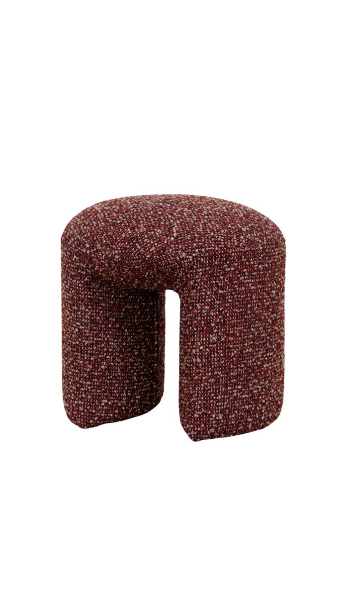 Red textured ottoman with a unique geometric shape modern design