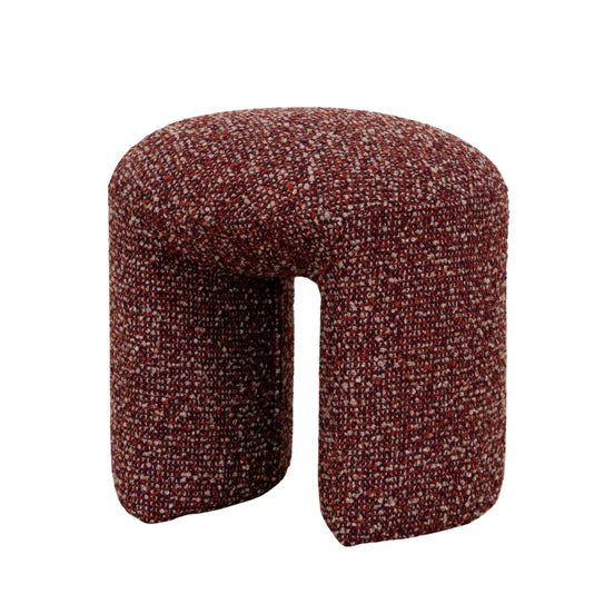 Red textured ottoman with a unique geometric shape modern design