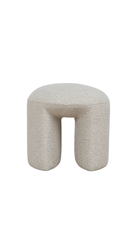 Beige textured ottoman with a unique geometric shape modern design