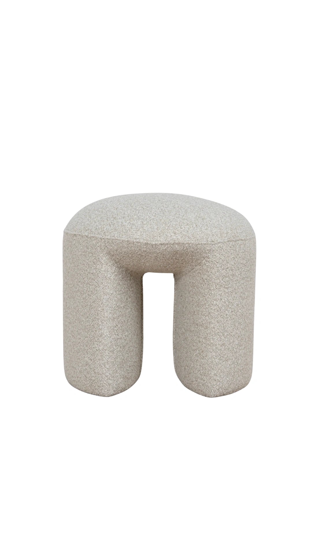 Oatmeal beige textured ottoman with a unique geometric shape modern design
