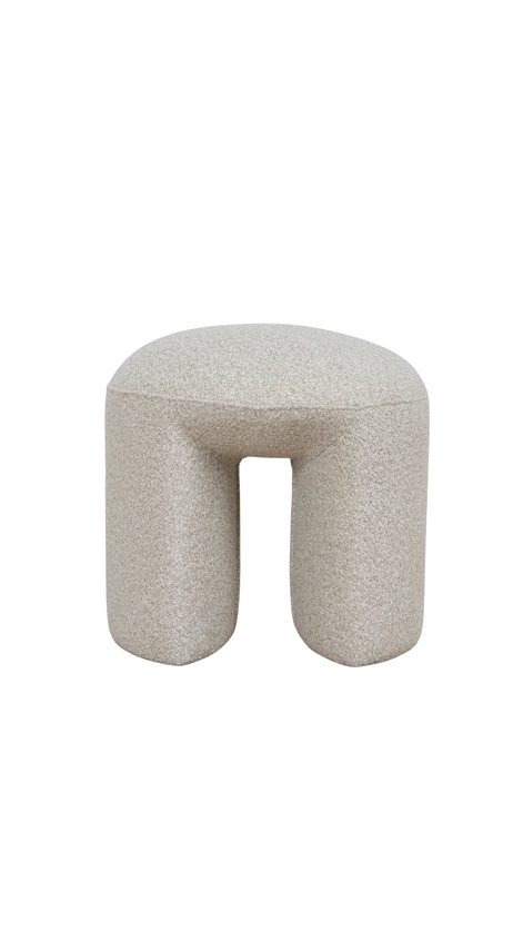 Oatmeal beige textured ottoman with a unique geometric shape modern design