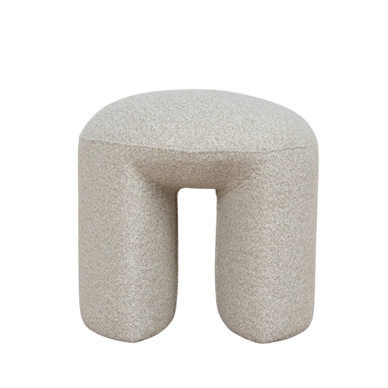 Oatmeal beige textured ottoman with a unique geometric shape modern design