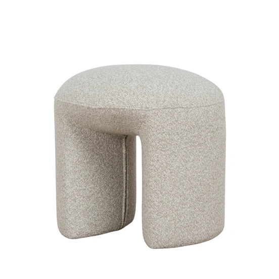 Oatmeal beige textured ottoman with a unique geometric shape modern design