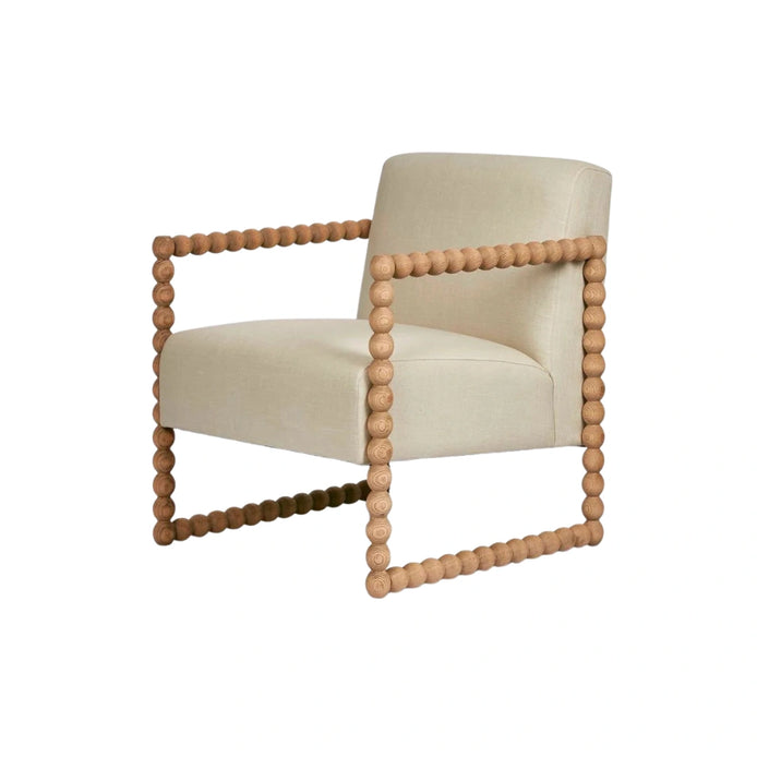 Beige armchair with wooden bead frame on a white background
